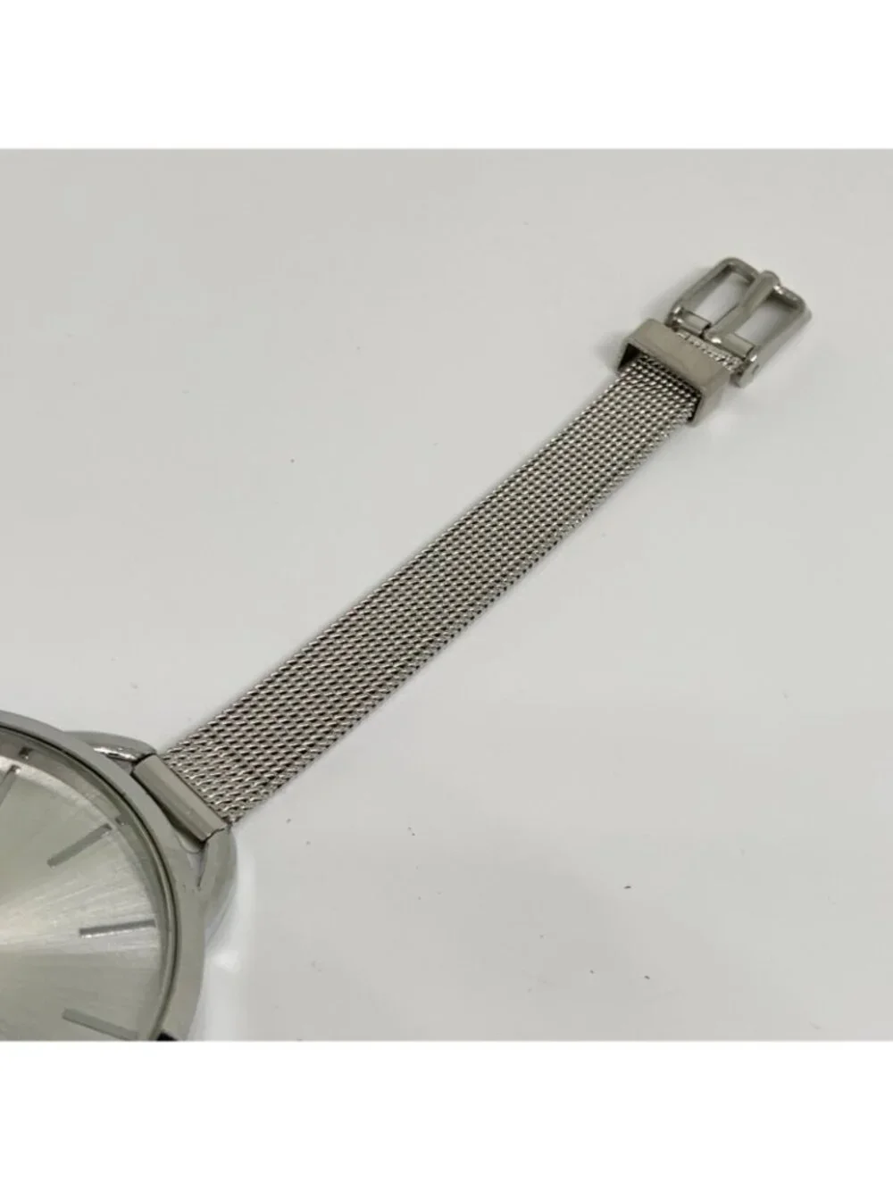 Silver tone women’s quartz analog watch 38mm adjustable mesh band running